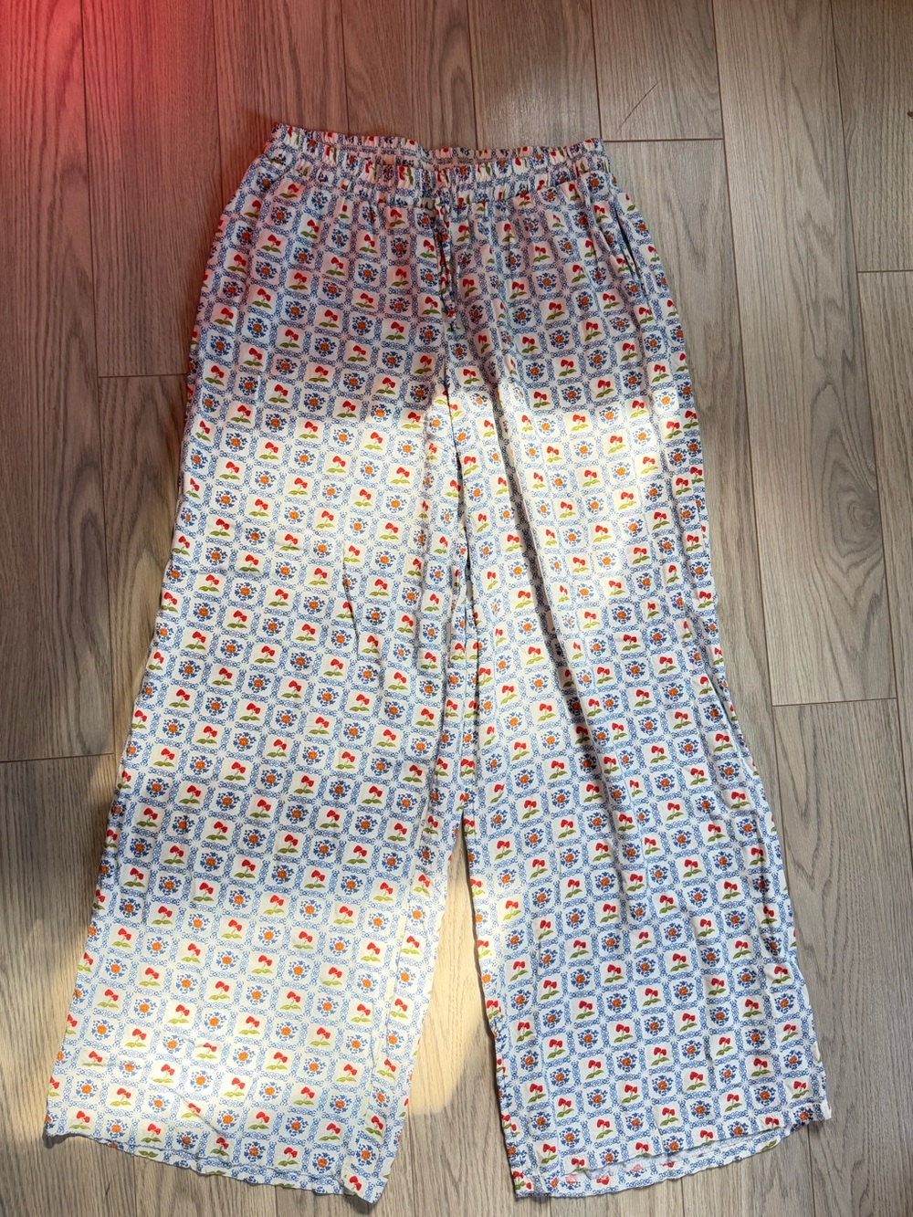 Dippin' Daisy's White Wide-Leg Pants with Multicolored Floral Pattern